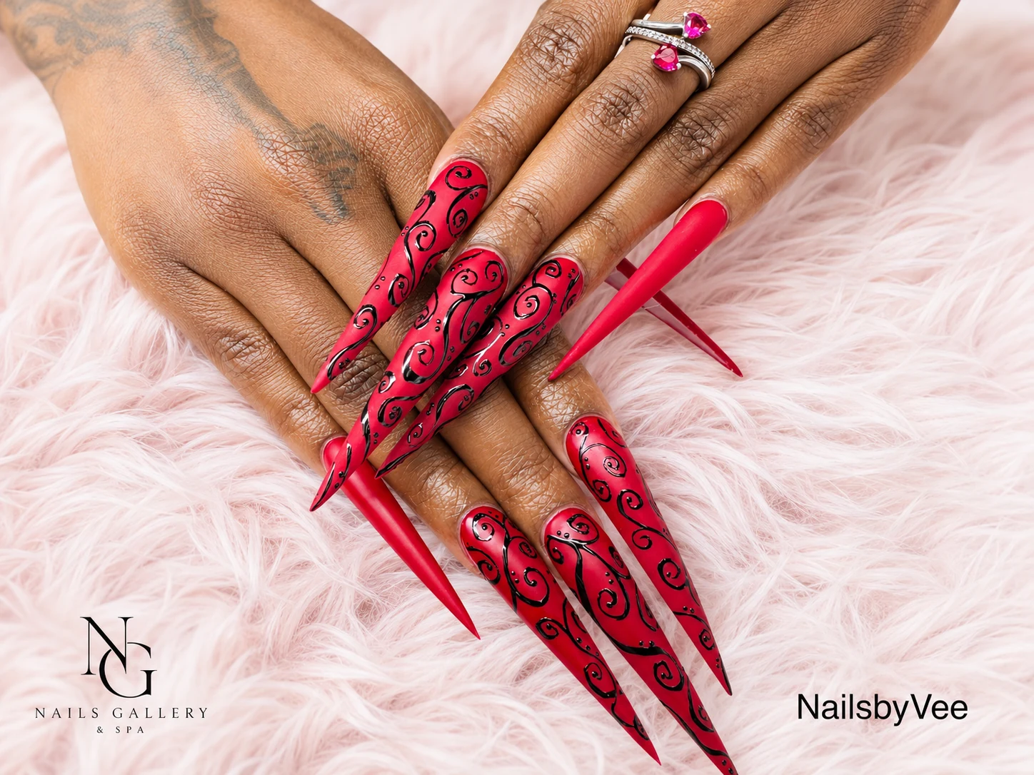 Bold red stiletto nail design